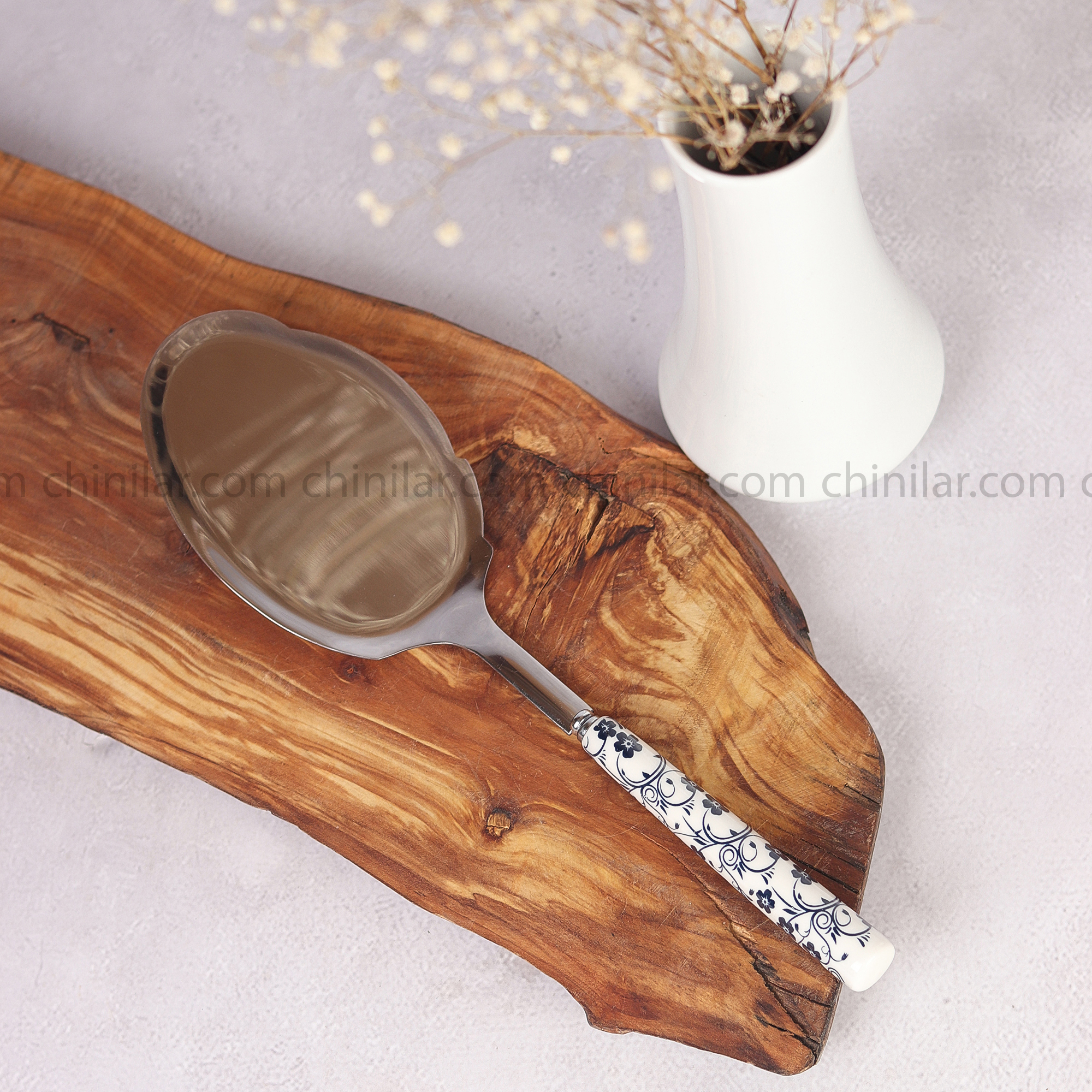 کفگیر استیل دسته گل آبی دنی هوم